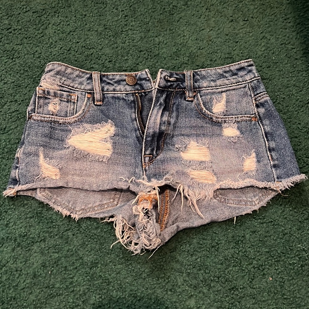 Distressed denim shorts